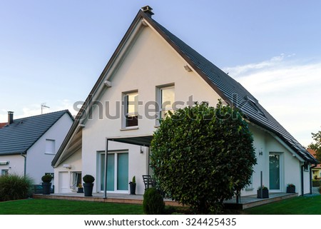 Classic family house  in small french village, Saint-Pierre Royalty-Free Stock Photo #324425435
