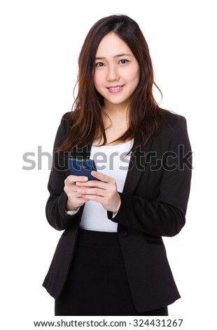 Asian businesswoman use of the mobile phone