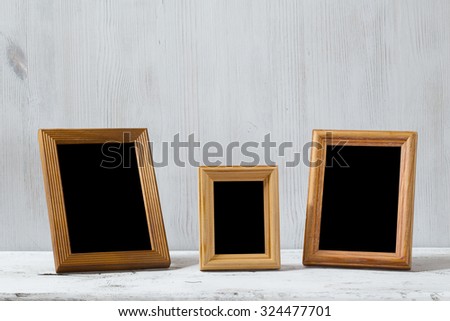 photo frames on old white table