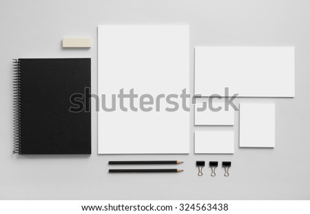 Mockup business brand template on gray background. Set of stationery with a black notepad. Royalty-Free Stock Photo #324563438