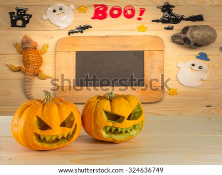 vintage tone image of Halloween background on wooden table