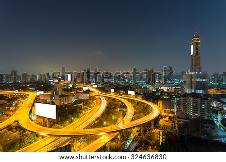 Bangkok Skyscraper and expressway at night , Thailand