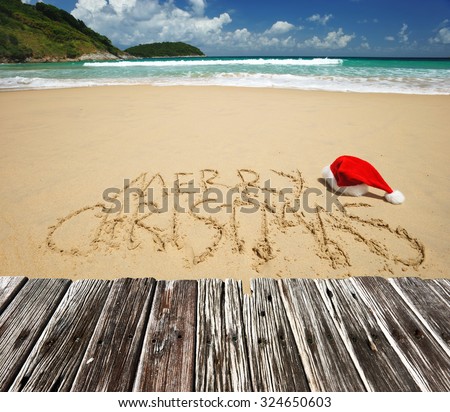 Santa's hat on a tropical beach