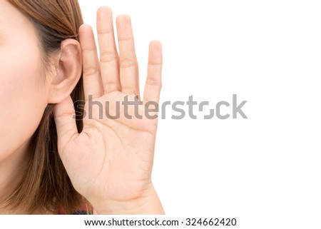 Asian woman hold her hand near her ear and listening Royalty-Free Stock Photo #324662420