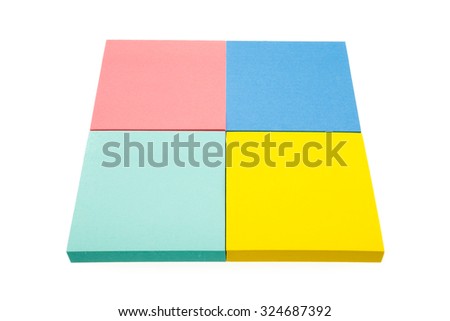 Four color block of paper notes isolated on white background