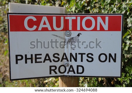 "Caution Pheasants on Road" Sign On Exmoor National Park on the Devon and Somerset Border in England, UK