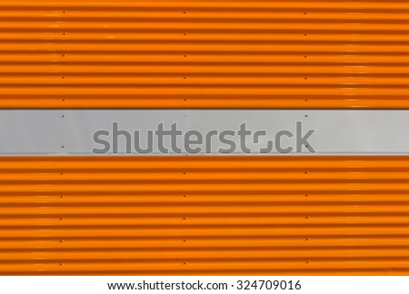 Orange and gray metal wall texture. Architectural background.