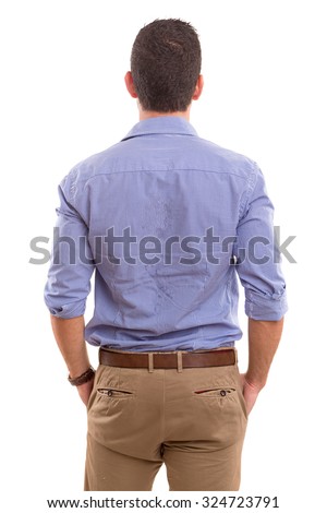 Young man with back turned to camera Royalty-Free Stock Photo #324723791