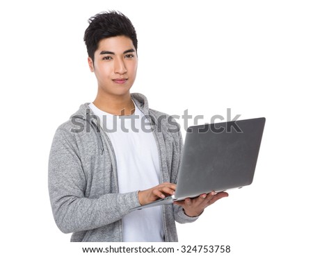 Young man use of the notebook computer