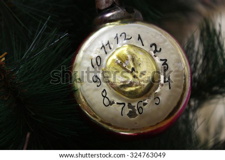Toy on the Christmas tree - the old clock