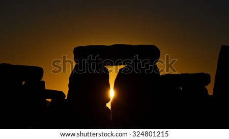 Silhouetted View of the Standing Stones at Stonehenge Seen at Sunrise