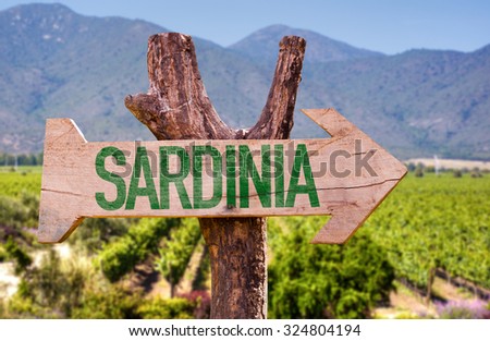 Sardinia wooden sign with field background