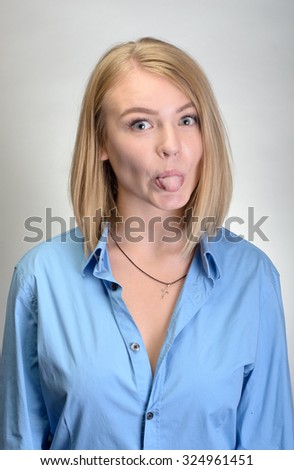 picture of girl sticking out her tongue