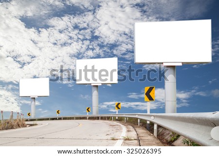 Blank billboard for your advertisement on road curve,Blue sky background