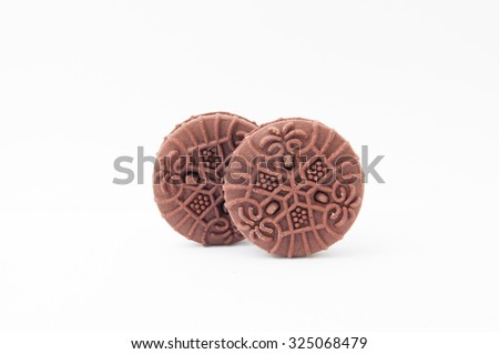 The chocolate sandwich biscuits on white background. -stock photo.