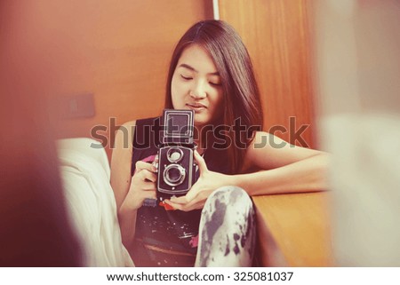 movement of photographer. portrait young woman in vintage style