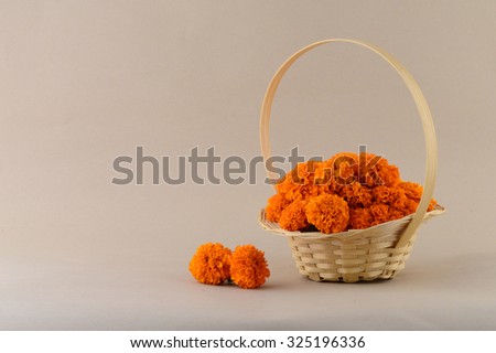 Marigold (Zendu Flowers) flowers in a bamboo basket.
