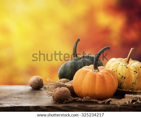 Autumn concept. Seasonal vegetables on wooden table.