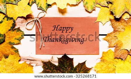 Thanksgiving day.  Decoration for holiday celebration with autumn leaves