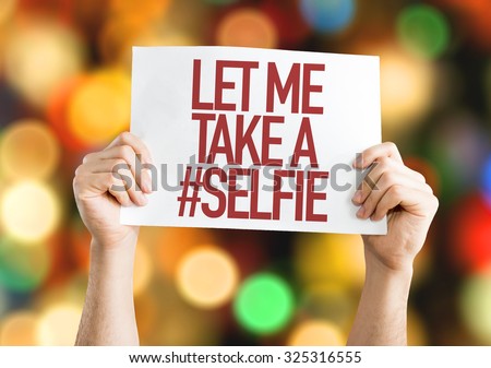 Let Me Take a #Selfie placard with bokeh background