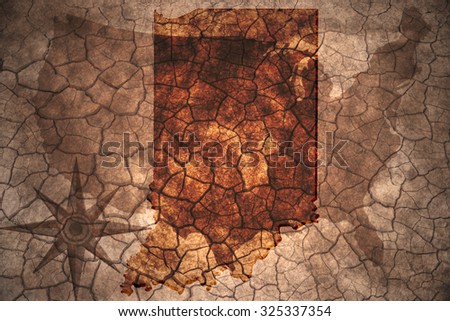Indiana state map on vintage usa map, crack paper background