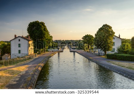 Briare, France, Bridge-canal intersection with Loire river Royalty-Free Stock Photo #325339544