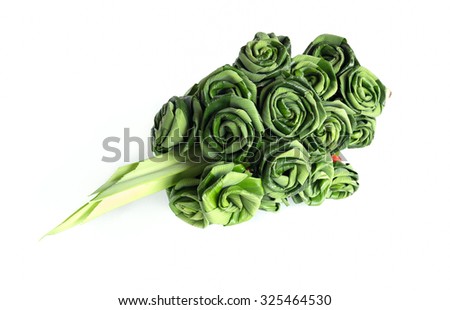 Fresh Pandanus leaf weave to rose bouquet isolated on white background