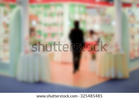Man alone, generic background. Intentionally blurred post production.