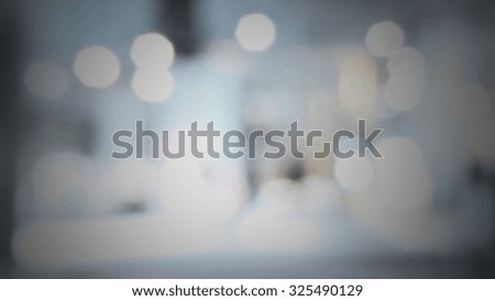 People silhouettes, generic background. Intentionally blurred post production.