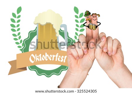 Oktoberfest character fingers against oktoberfest graphics