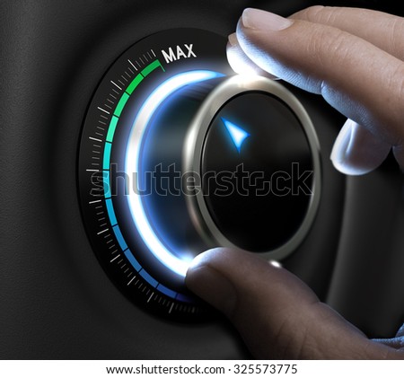 Man fingers setting a difficulty button on highest position. Concept image for illustration of high level of risk taking. Royalty-Free Stock Photo #325573775
