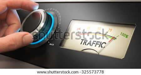 Hand turning a knob up to the maximum, Concept image for illustration of audience analysis and website traffic improvement. Royalty-Free Stock Photo #325573778