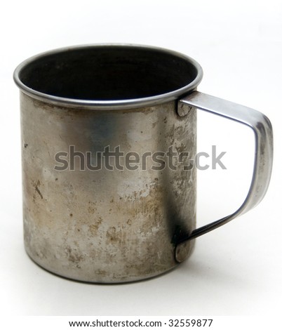 metal old dirty cup isolated