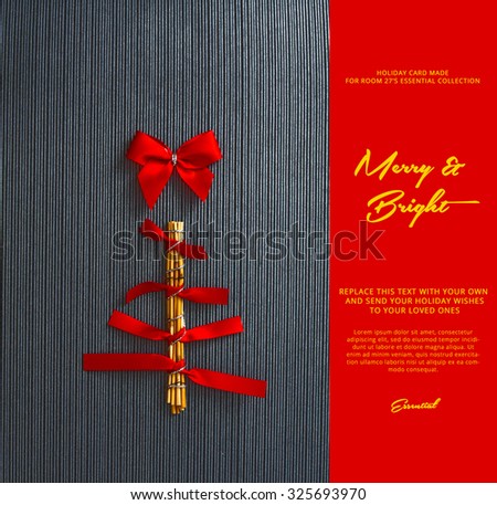 conceptual handmade christmas tree , made with wood and red ribbons