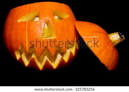 Pumpkin for Halloween isolated on black background.