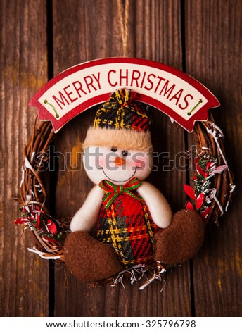 Merry Christmas sign on distressed wooden wall