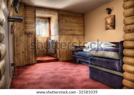hotel bedroom in colors red and blue empty