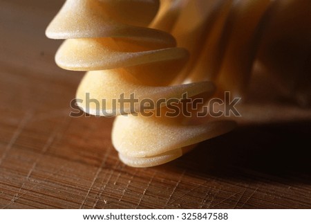 pasta scrollwork on the wooden table
