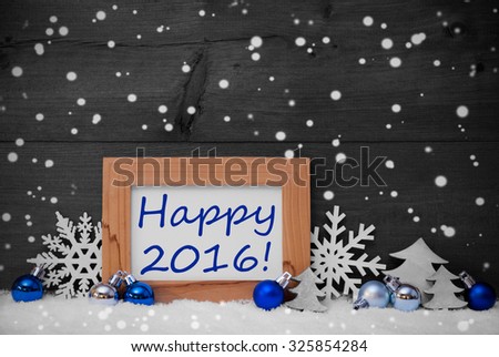 Blue Gray Christmas Decoration On Snow. Christmas Tree Balls, Snowflakes And Christmas Tree. Picture Frame With English Text Happy 2016. Rustic, Vintage Brown Wooden Background. Black And White Image