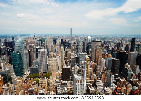 Manhattan midtown panorama view with big skyscrapers, New York City, USA. Manhattan beautiful skyline, NYC panorama. Top of the buildings in financial district. Business background.