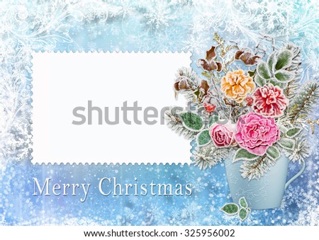 Christmas greeting card  with a bouquet of flowers and branches with hoarfrost