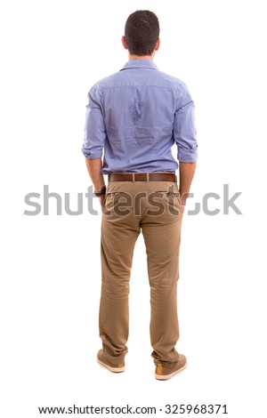 Young man with back turned to camera Royalty-Free Stock Photo #325968371