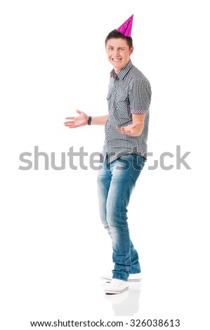 Young man in shirt with birthday cap, isolated on white background