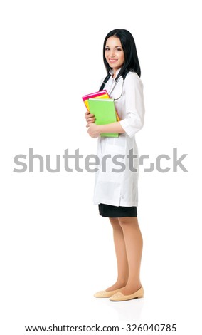 Smiling medical doctor woman with stethoscope and books, isolated on white background