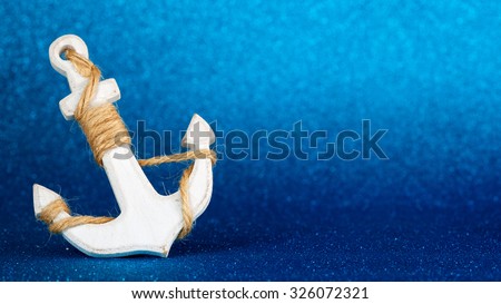 white anchor isolated in a blue glistening backdrop