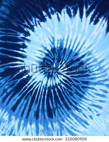 close up shot of spiral blue tone color tie dye fabric texture background in 4 x 5 ratio Royalty-Free Stock Photo #326080904