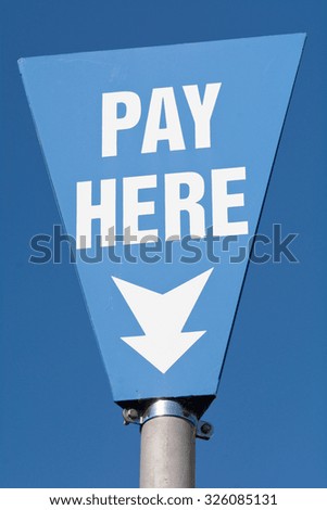 Pay Here sign in car park