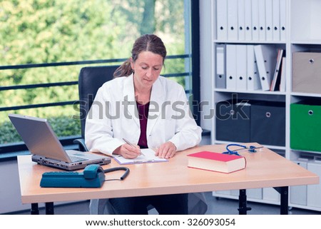 young female doctor in her office 
