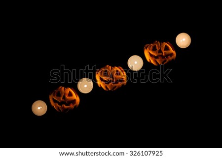 Halloween's pumpkins and candles
