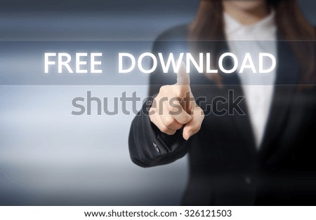 businesswoman, Focus on hand pressing Free Download button on virtual screens.